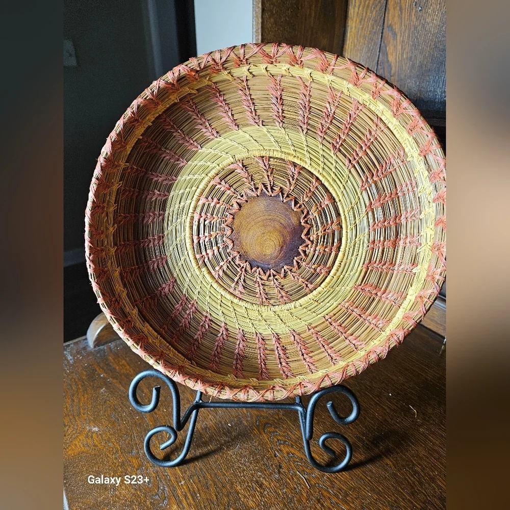 Primitive Handwoven 10 Inche Basket With A Wood Medallian In The Middle.